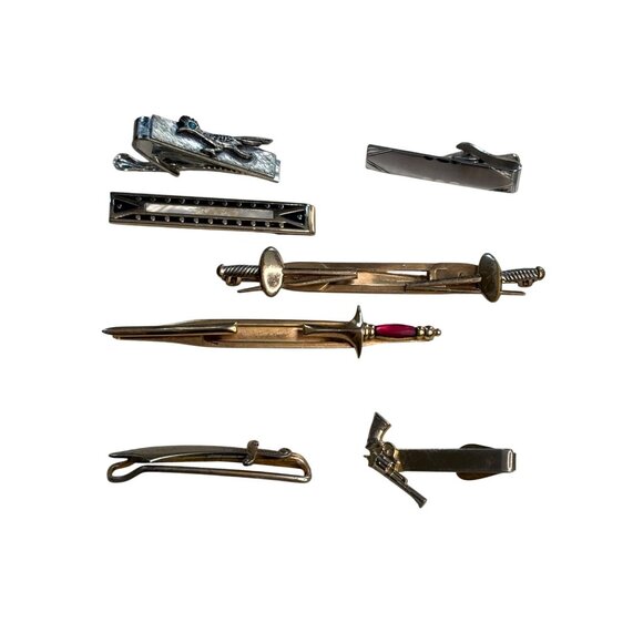Vintage Mens Tie Clips Lot Of 7 Mixed Designs Sword Gun Harmonica Gold & Silver - Picture 1 of 16